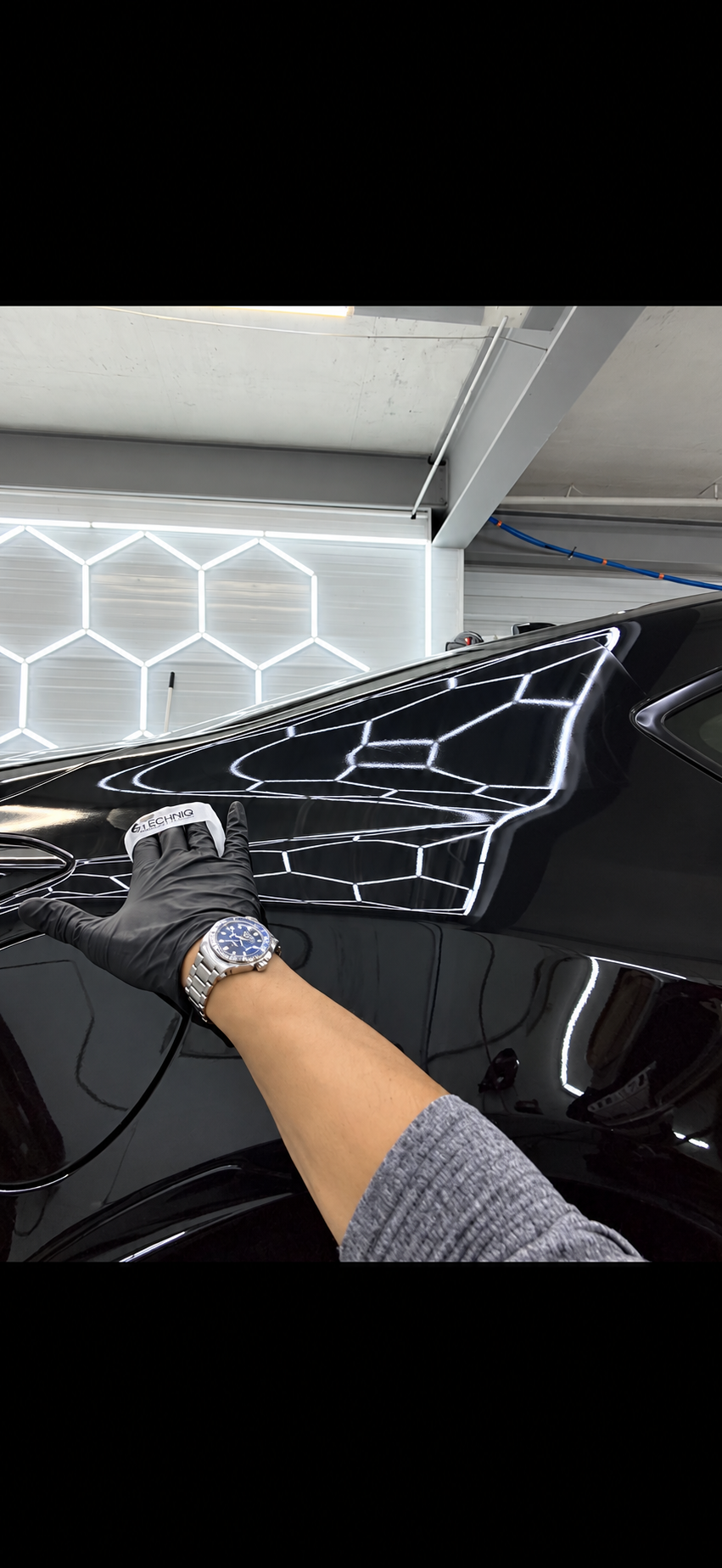Gtechniq ceramic coating application on black vehicle at Four Seasons Auto Sun Prairie